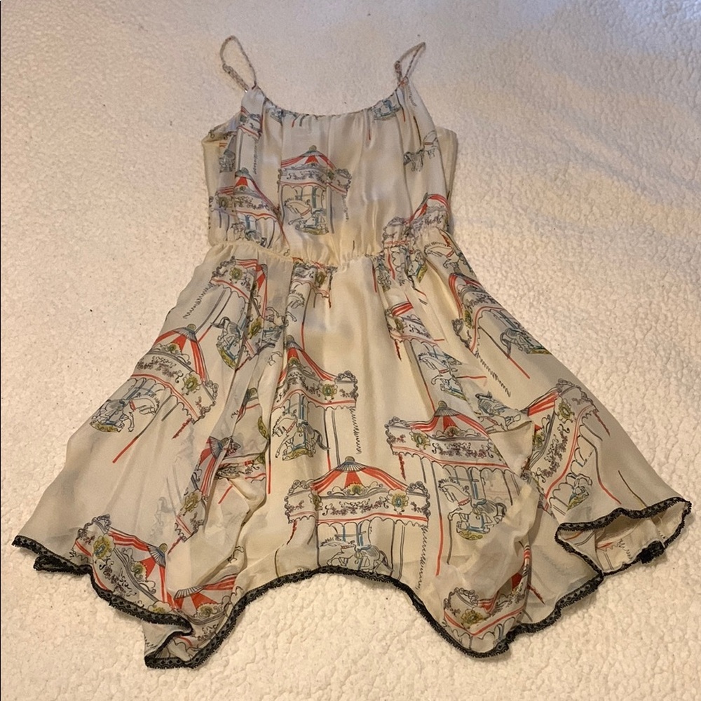Chic Silk Dress with Spaghetti Straps and Whimsical Print